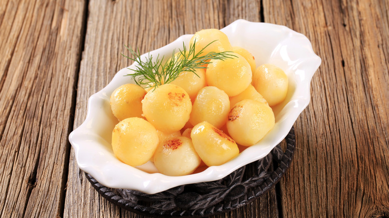 Parisian potatoes in white dish