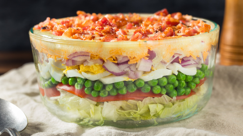 Seven layer salad on table