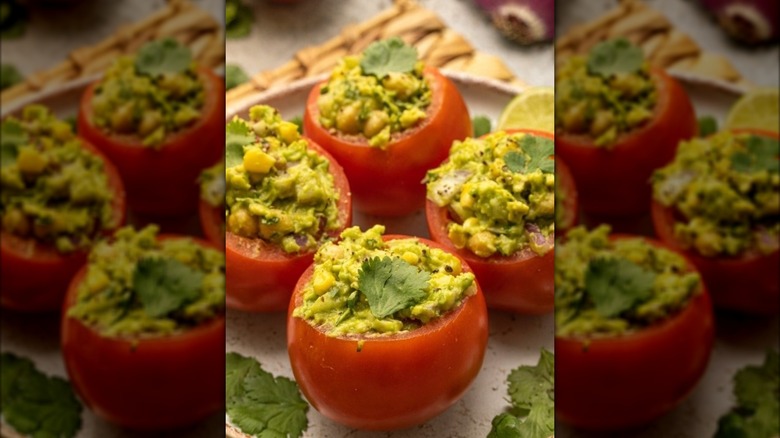 Tomatoes stuffed with guacamole