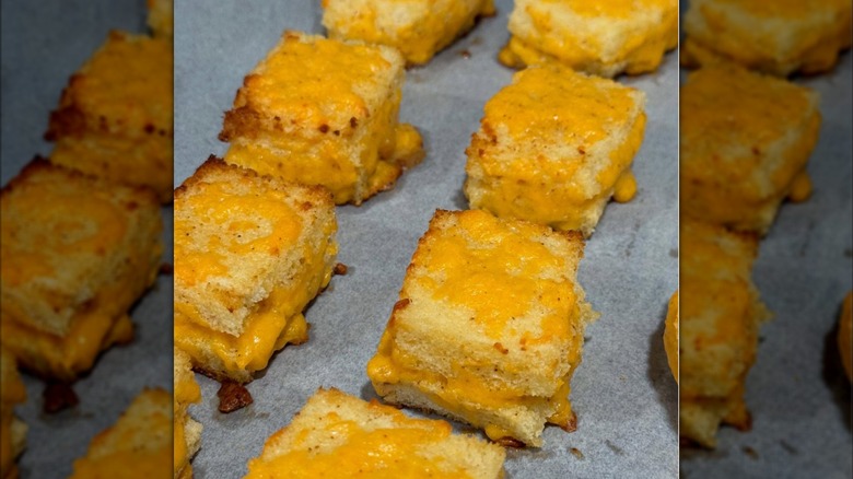Tray of freshly baked cheese dreams