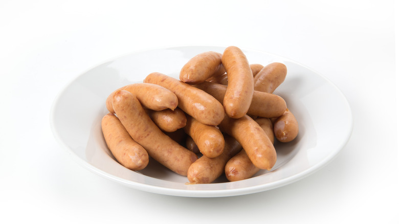 Vienna sausages on a white plate