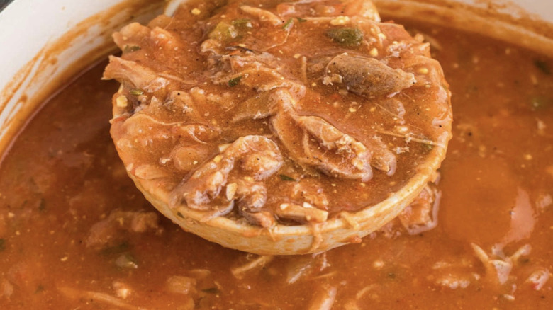 Close-up of ladle with Creole turtle soup