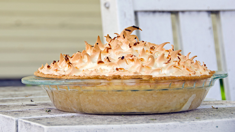 Meringue pie in dish on porch