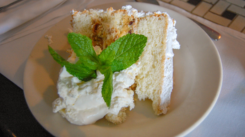 Slice of Lane cake on plate