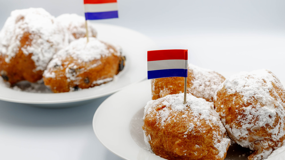 Fried doughnut with a Dutch flag 