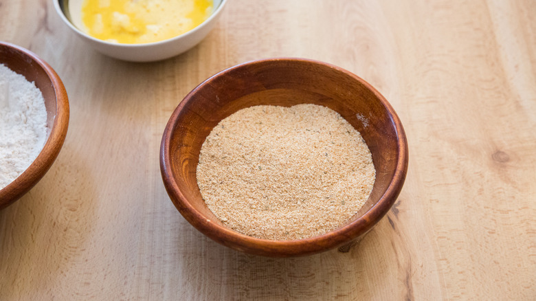 breadcrumb mixture in wooden bowl
