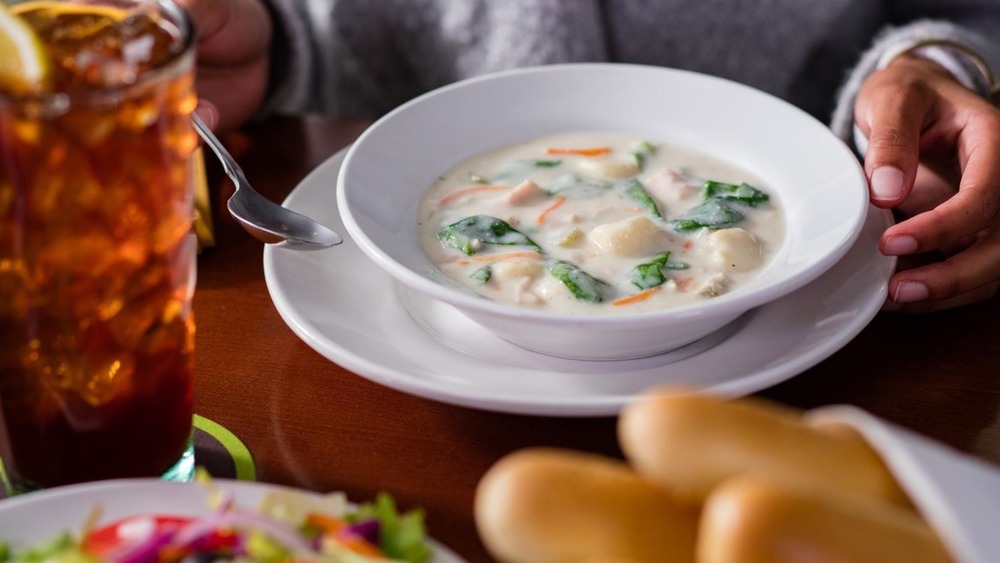 Olive Garden soup in white bowl