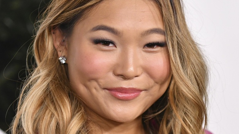Close up of Chloe Kim after winning her Olympic gold medal