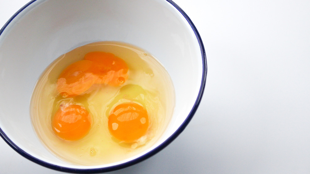 cracked eggs in a bowl