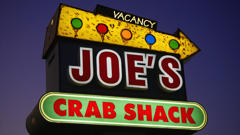 joe's crab shack signage at dusk