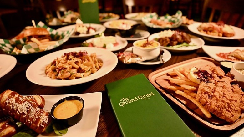 Various dishes served at the Ground Round along with a menu.
