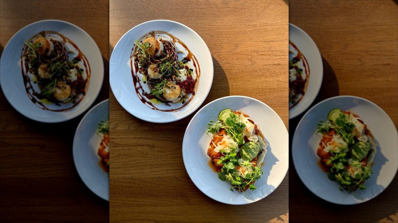 two dishes on display at modern bird restaurant in michigan