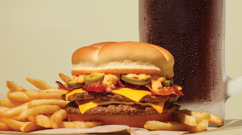 Jalapeño Queso Bacon Double Cheeseburger with french fries and soda from A&W