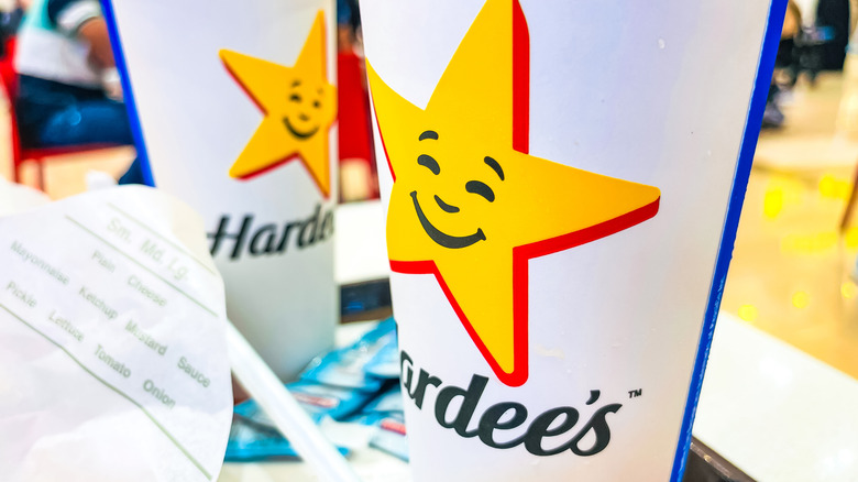 Hardee's branding on two cups