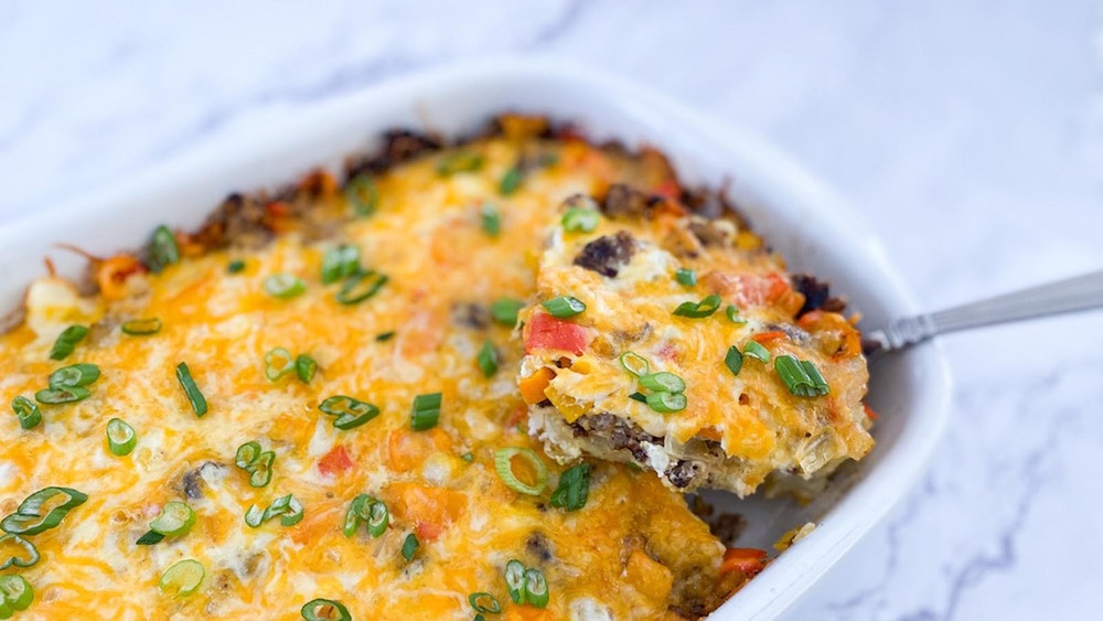 Sausage breakfast casserole in a white casserole dish