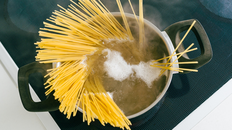 Spaghetti in large pot of boiling water