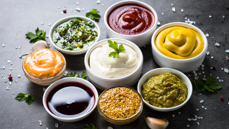Various sauces on marble slab