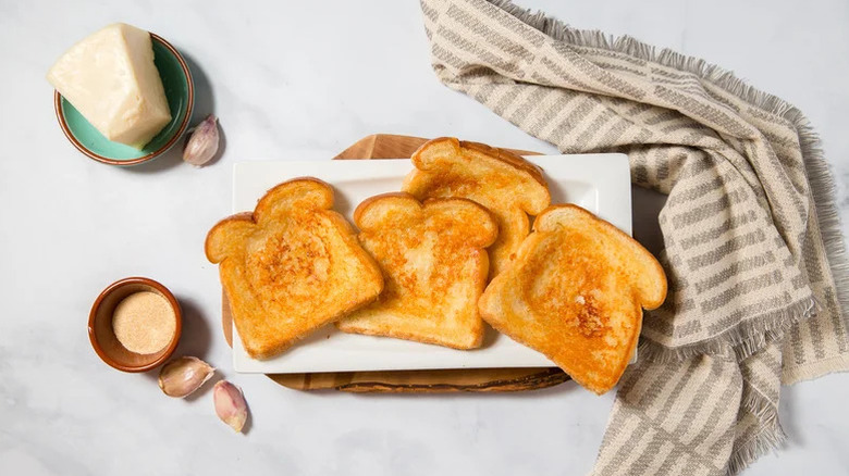 Four slices of copycat Sizzler's Cheese Toast on plate