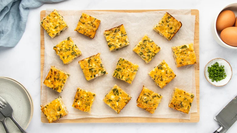 Slices of a copycat Starbucks Potato Chive Bake on a tray