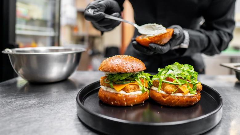 Chef plating food in restaurant kitchen