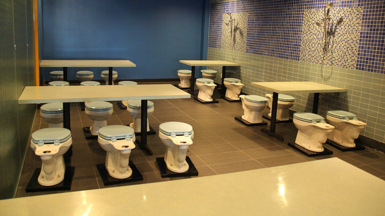 Empty tables at Magic Restroom Cafe