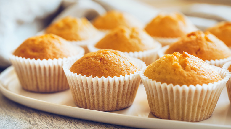 domed cupcakes on a tray