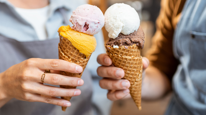 Two double scoop ice cream cones