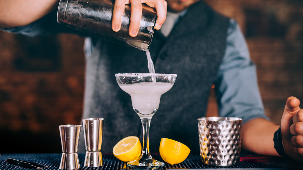 bartender pouring margarita