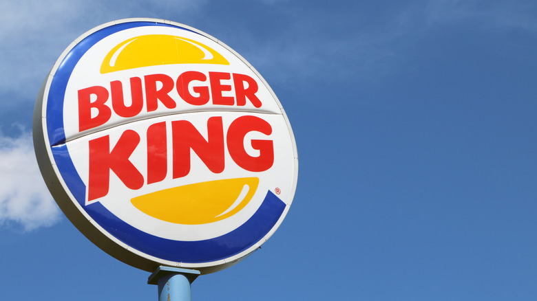 Burger King sign with blue sky background