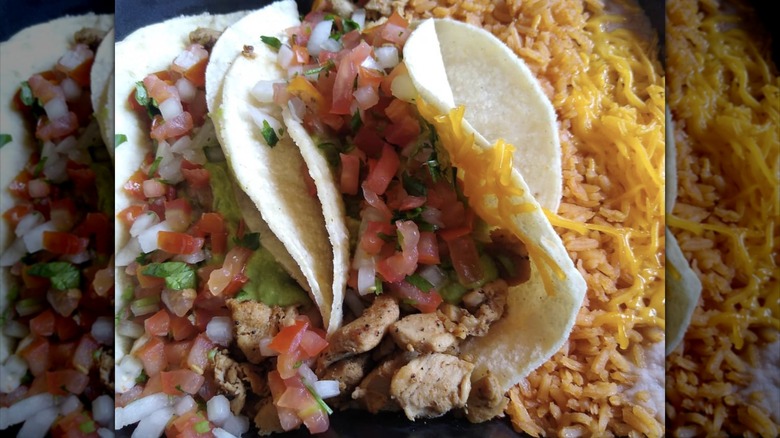 Chicken tacos, rice, and beans from Filiberto's Mexican Food