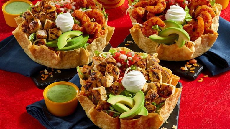 El Pollo Loco's double tostadas with chicken, shrimp, sour cream, veggies, and creamy green salsa.