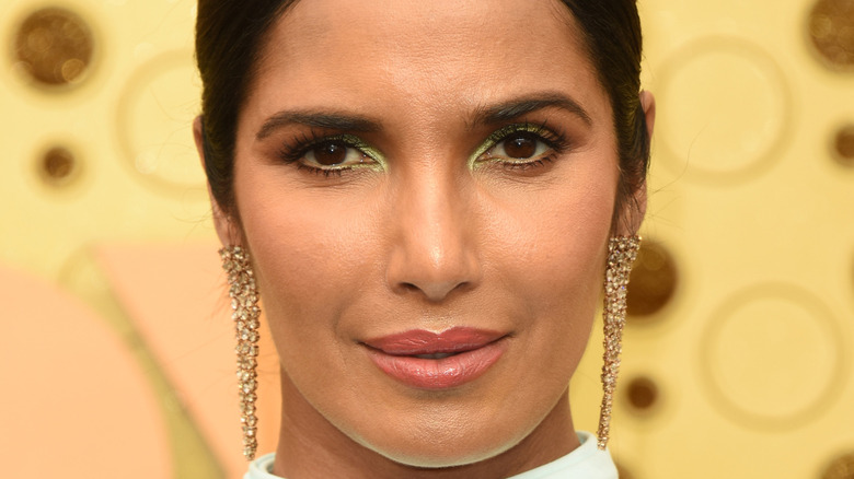 Closeup of Padma Lakshmi with diamond earrings 