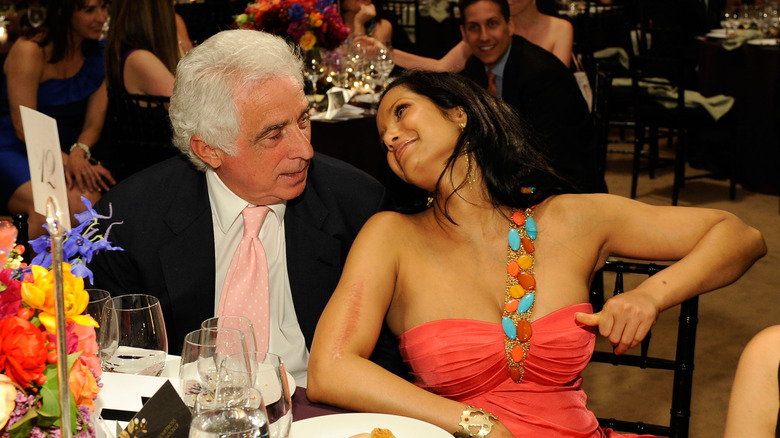 Padma Lakshmi sits with Teddy Forstmann