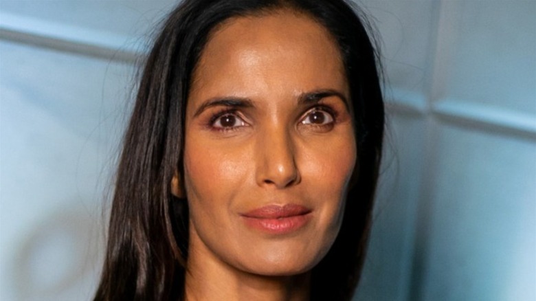 Padma Lakshmi smiling slightly