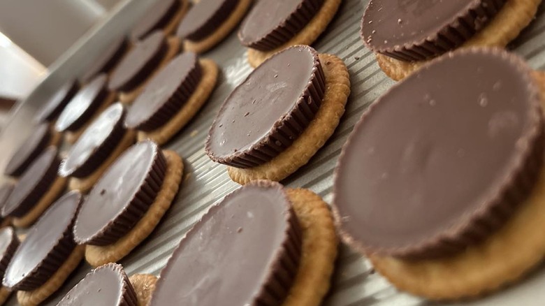 Peanut butter cups on crackers