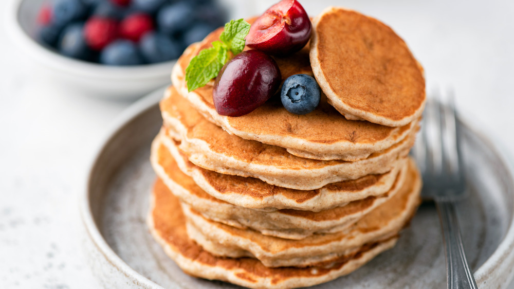 stack of pancakes and fruit