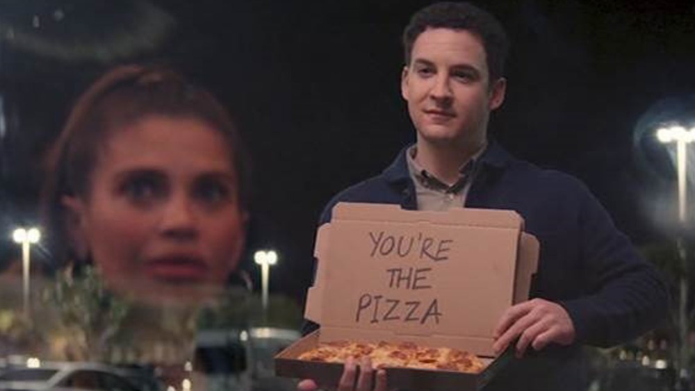 Ben Savage holding pizza box with note