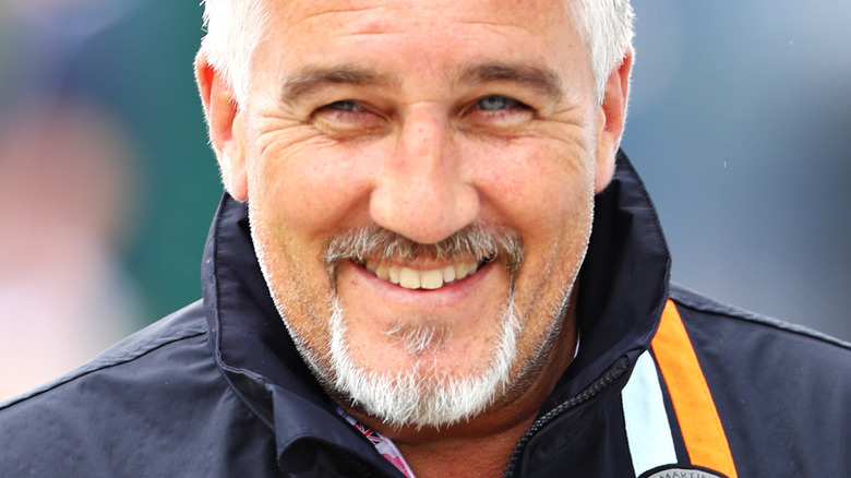 Paul Hollywood with goatee and wide smile