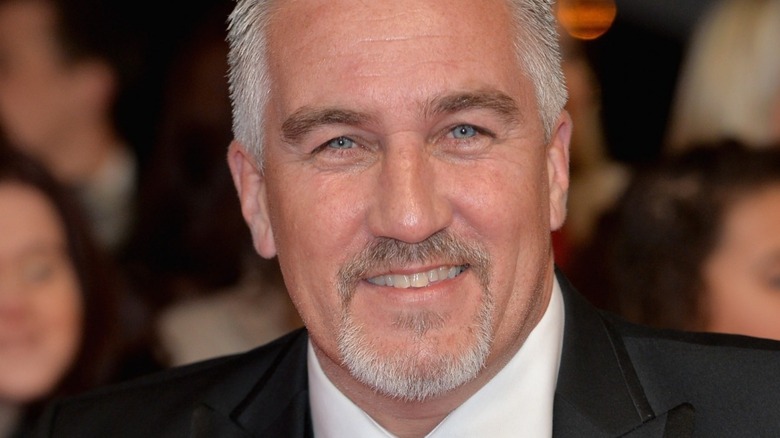 paul hollywood smiling at an event