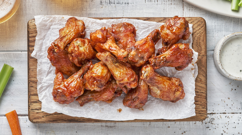 Buffalo wings on a board 