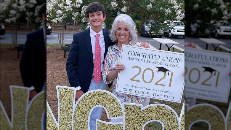 Paula Deen posing outside with her grandson, Jack Deen.