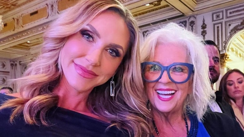 Lara Trump posing with Paula Deen at Mar-a-Lago