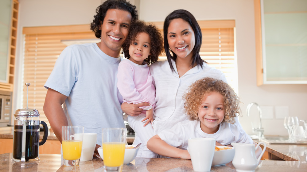 Family with orange juice