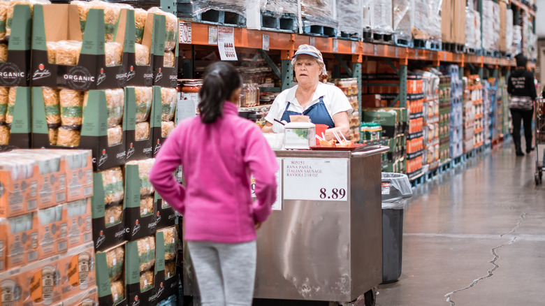 costco shopper getting samples