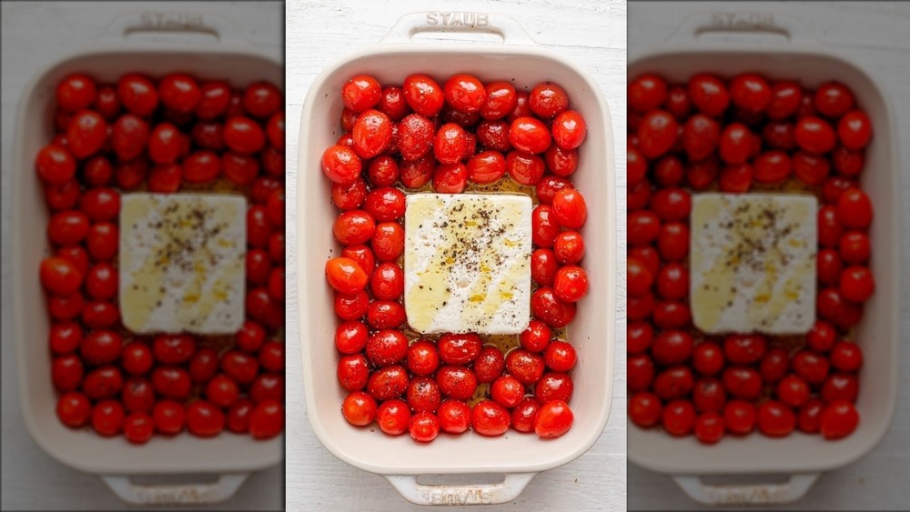 Feta and tomatoes in pan