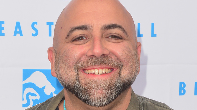 Duff Goldman smiling at event 