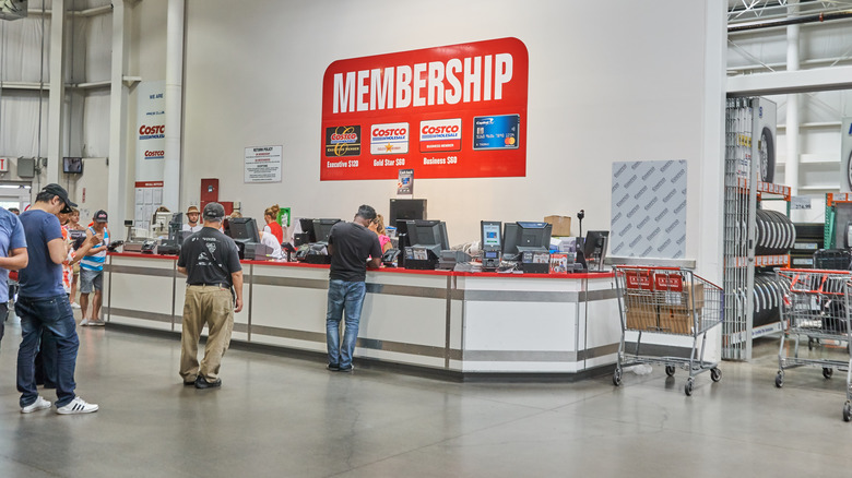 Costco shoppers line up at counter