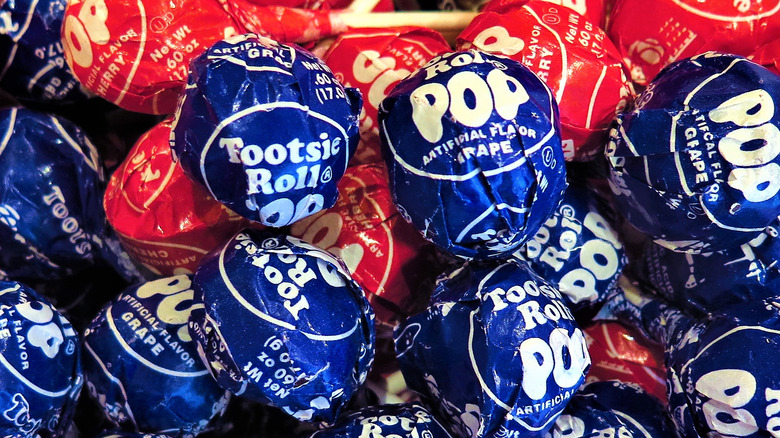 Blue and red wrapped Tootsie Pops