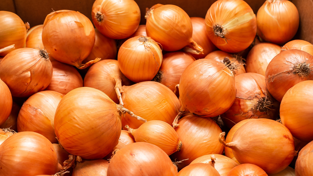 A stack of yellow onions