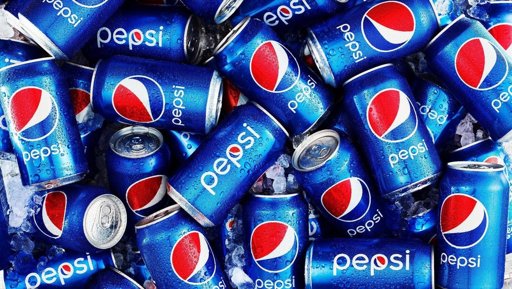 Pepsi cans in pile